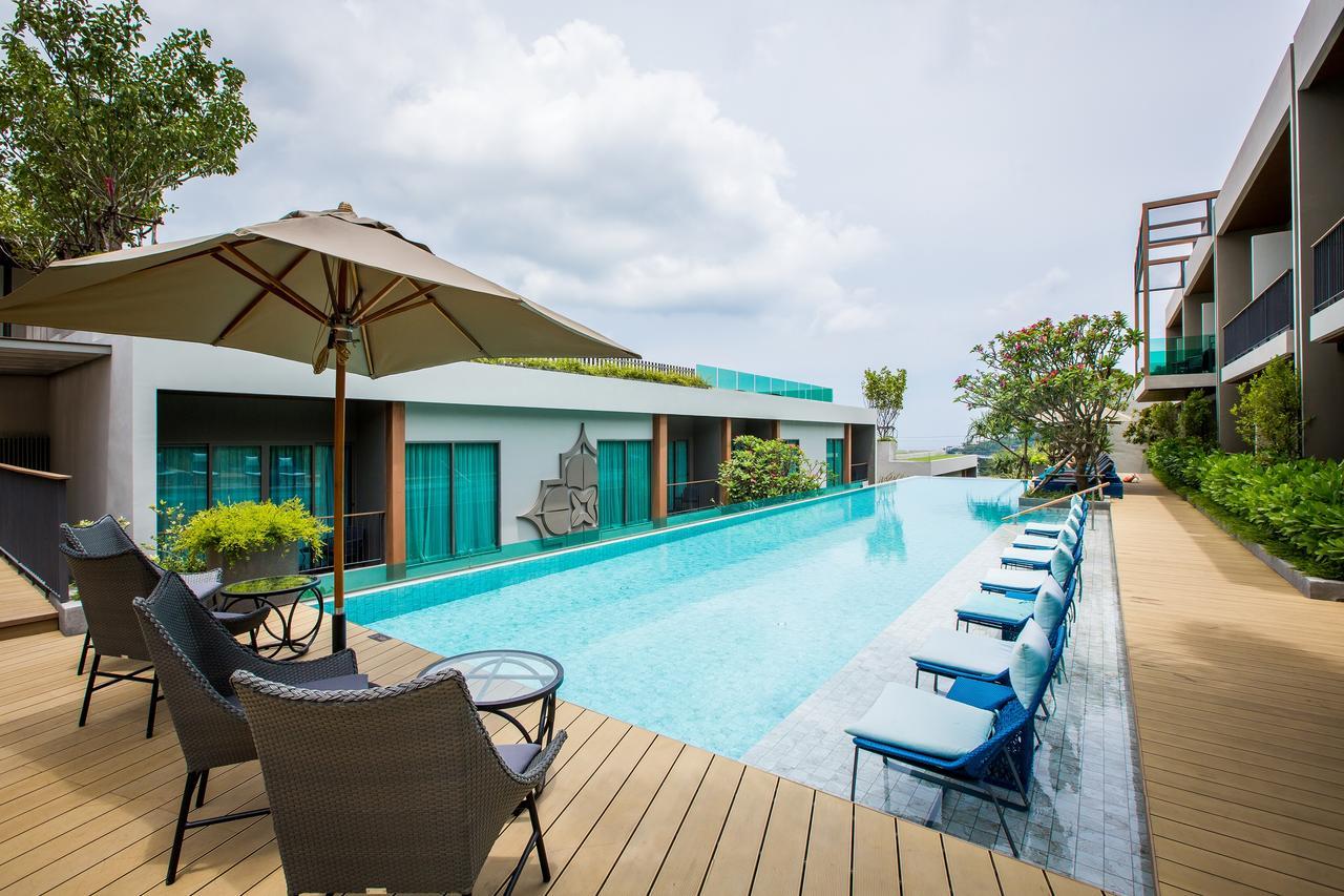 Fusion Suites Phuket Patong Exterior foto The swimming pool at the hotel