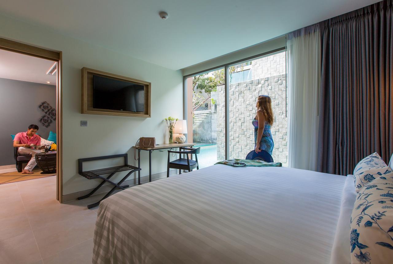 Fusion Suites Phuket Patong Exterior foto A room at the hotel